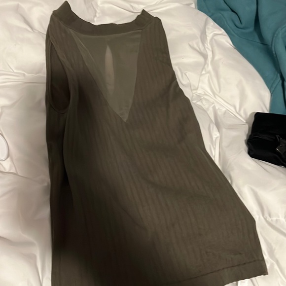 Dark green part mesh no sleeves top. - Picture 1 of 4